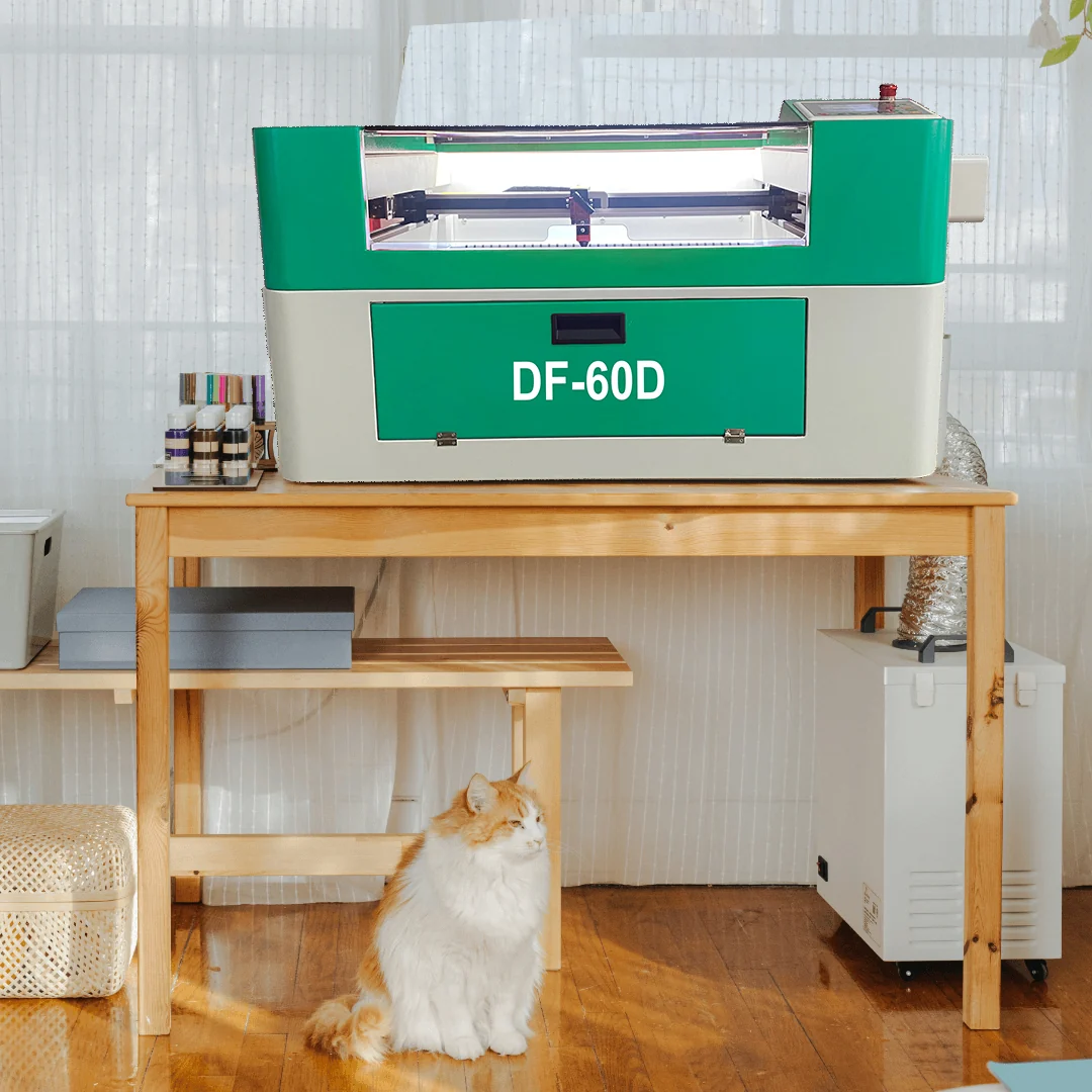 DF60 CO2 laser production setup with supporting equipment