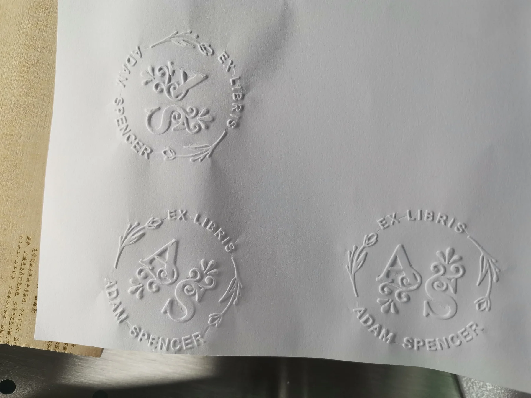 Real paper embossing result produced with POM dies