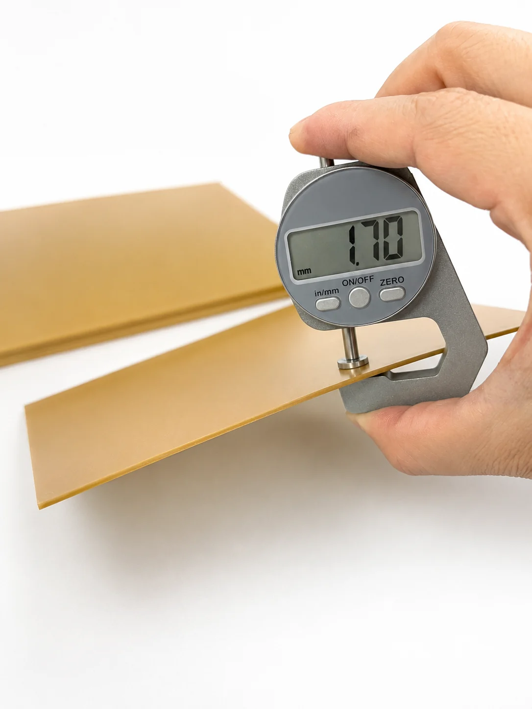 1.7 mm POM sheet thickness measured for handheld embosser die production