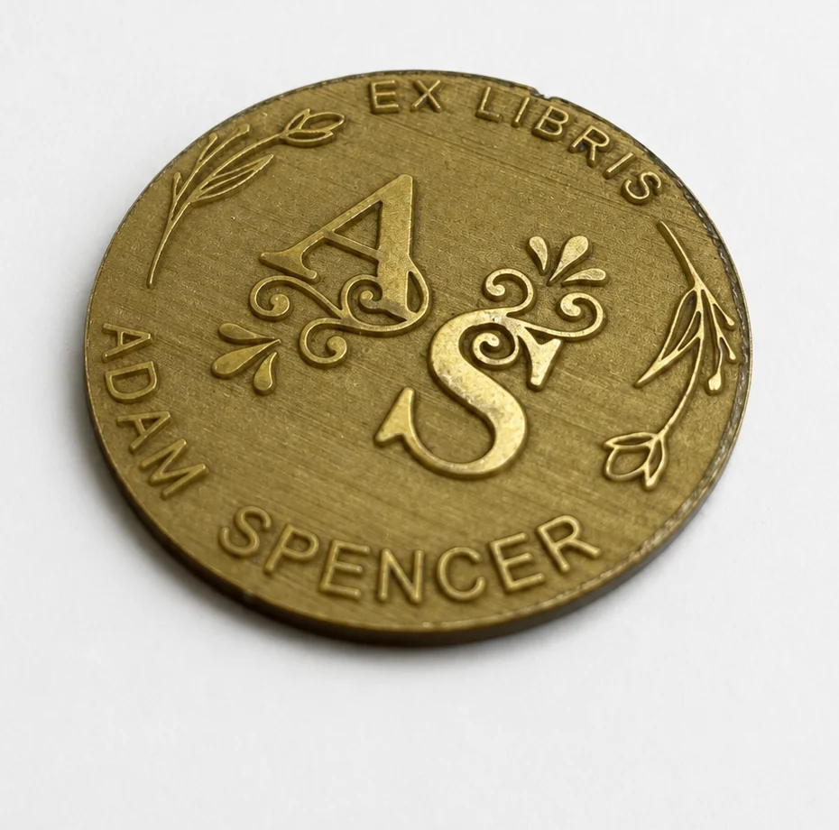 Close-up of sloped relief sidewalls on a laser-produced POM embosser die
